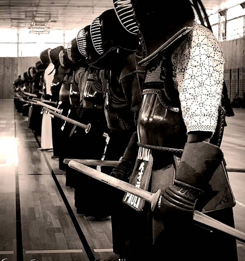 Kendo practitioners lined up in armor