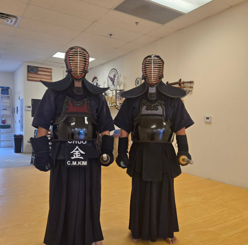 Two Kendo practitioners in armor